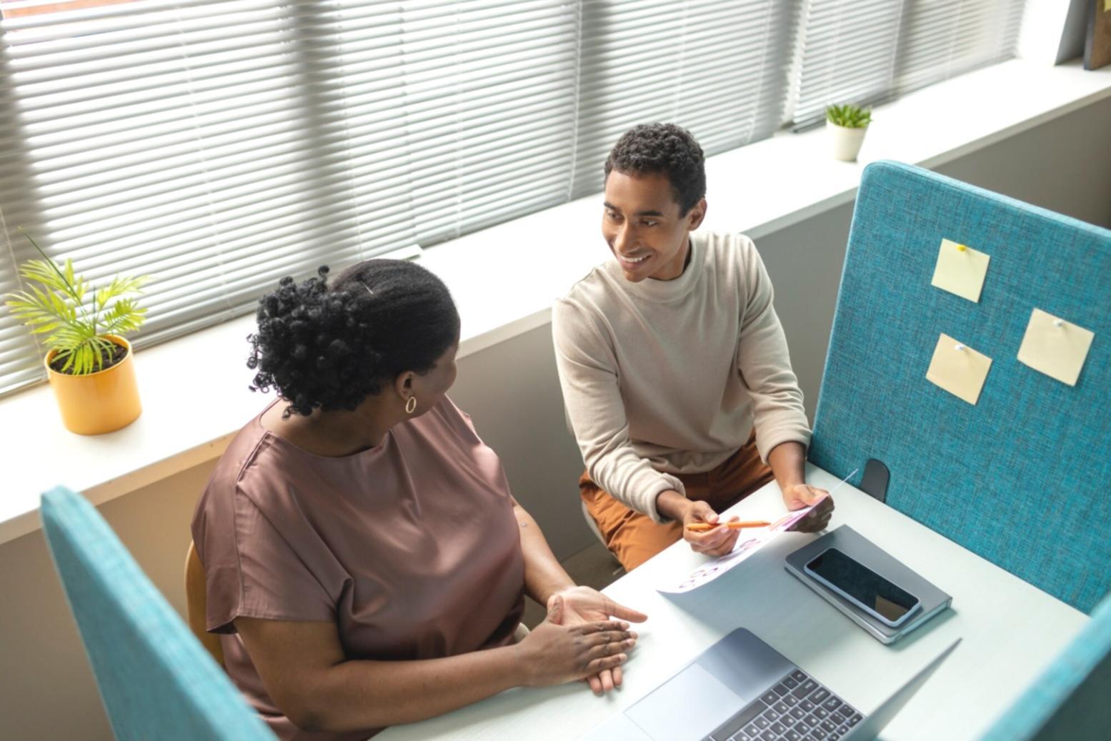 Professional business meeting discussing budget planning strategies